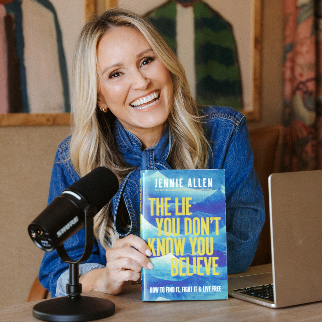 Jennie Allen holding her book, The Lie You Don't Know You Believe
